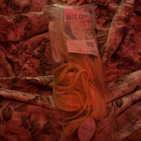 20 in’ blonde wig with 100% human hair and 180% density